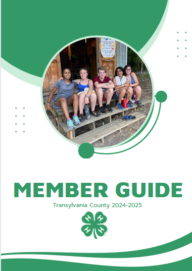 Image of the front of the member guide. Shows pictures of smiling children at camp on a green and white background